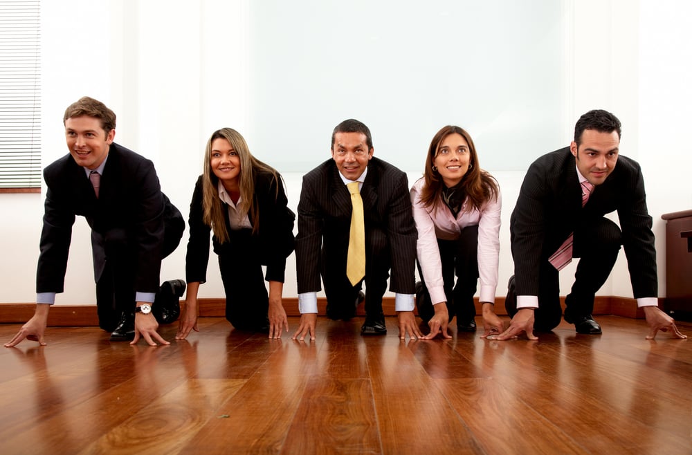 Business competition in an office with businessmen and businesswomen taking part