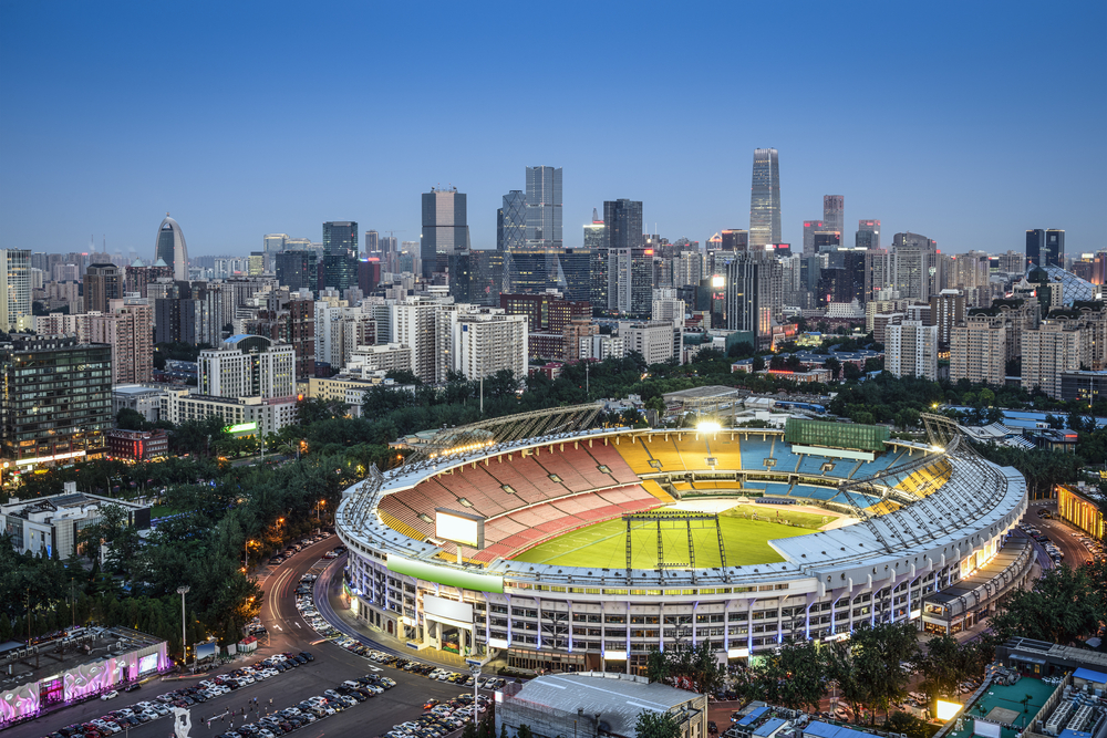 Beijing, China skyline and stadium.