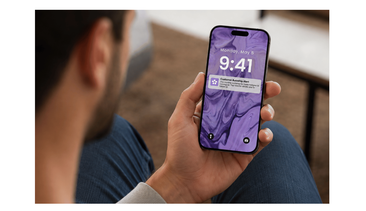 Sales rep receiving a mobile notification prompting his next follow-up task